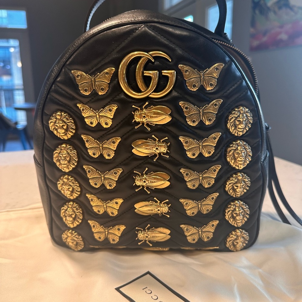 Gucci Marmont gold hardware, bees and butterflies backpack.